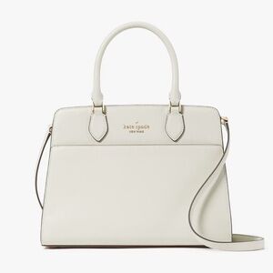 Kate spade satchel with crossbody strap. NWT in color meringue